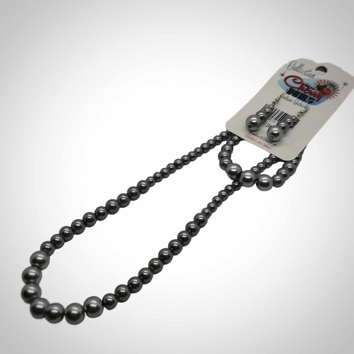 Ensemble collier, bracelet, boucles d'oreilles argent