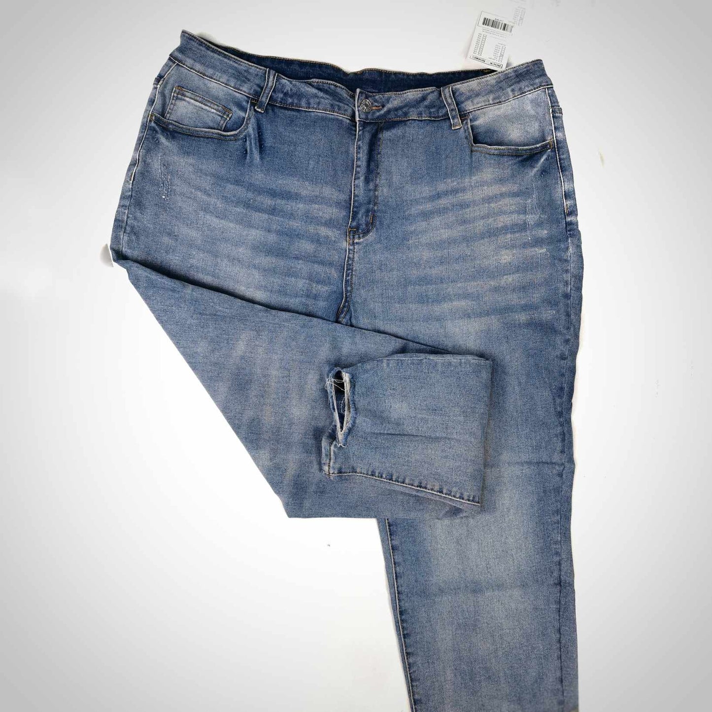Jeans pâle de style délavé avec rebords effilés, jambes étroites