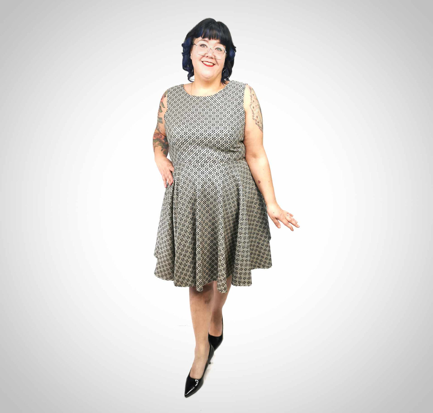 Robe taille plus ligne A motifs dorés