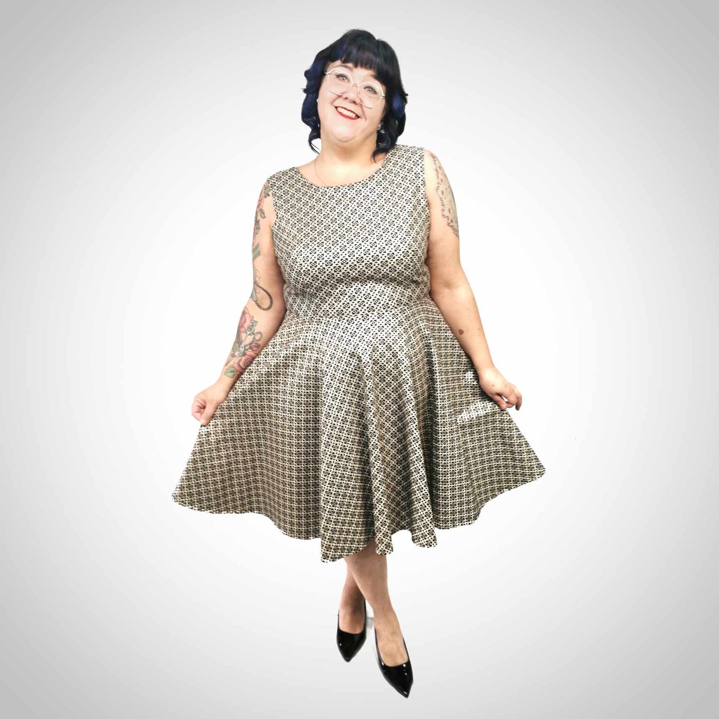 Robe taille plus ligne A motifs dorés