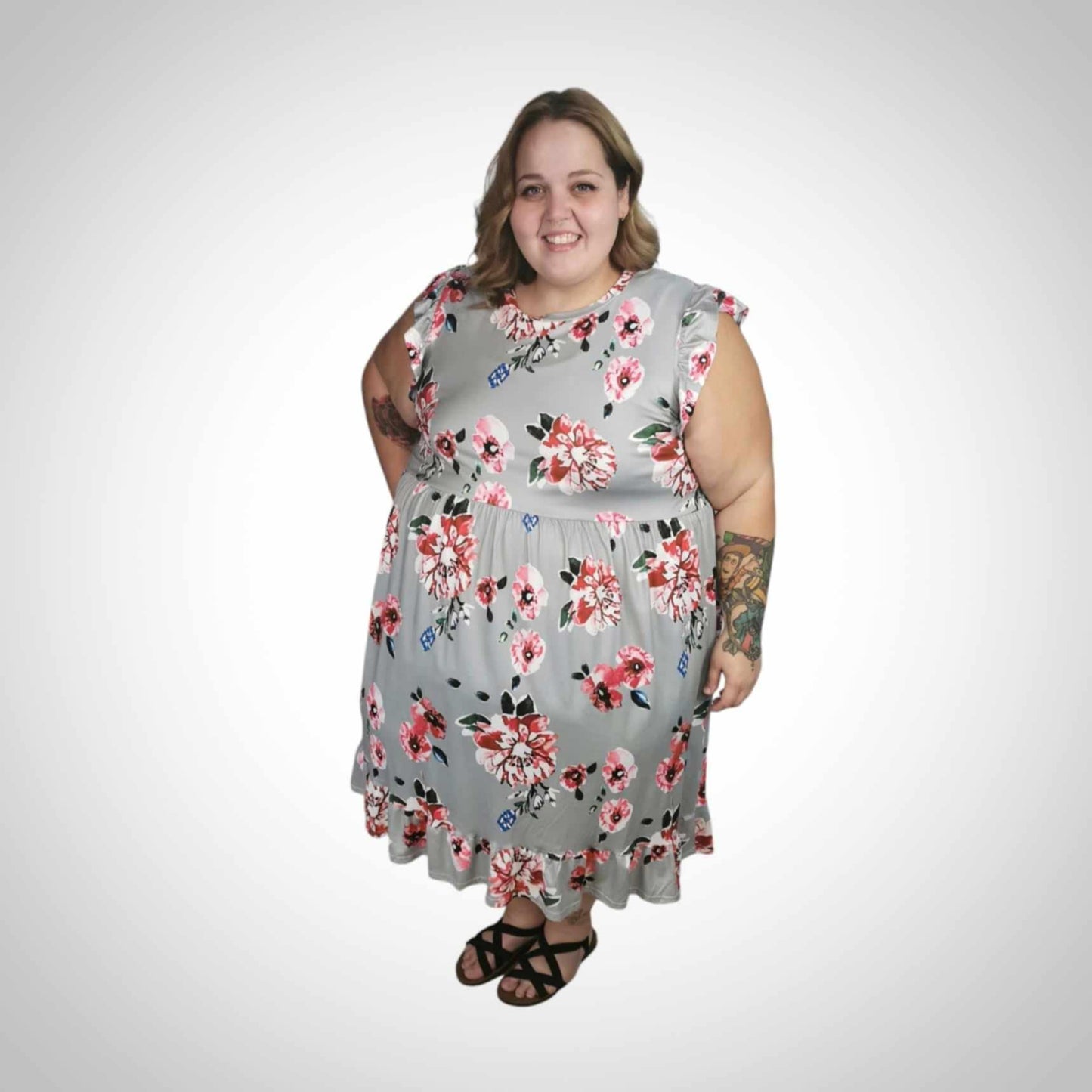 Robe bleu à fleurs à manches frivoles