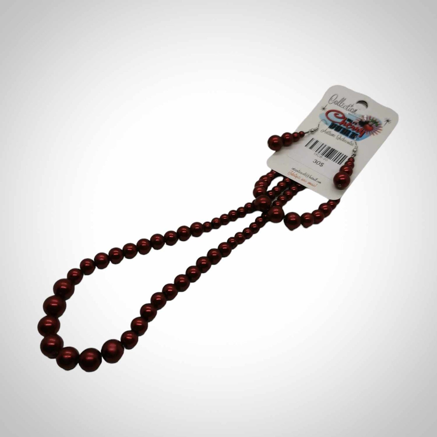 Ensemble collier, bracelet, boucles d'oreilles rouge vin