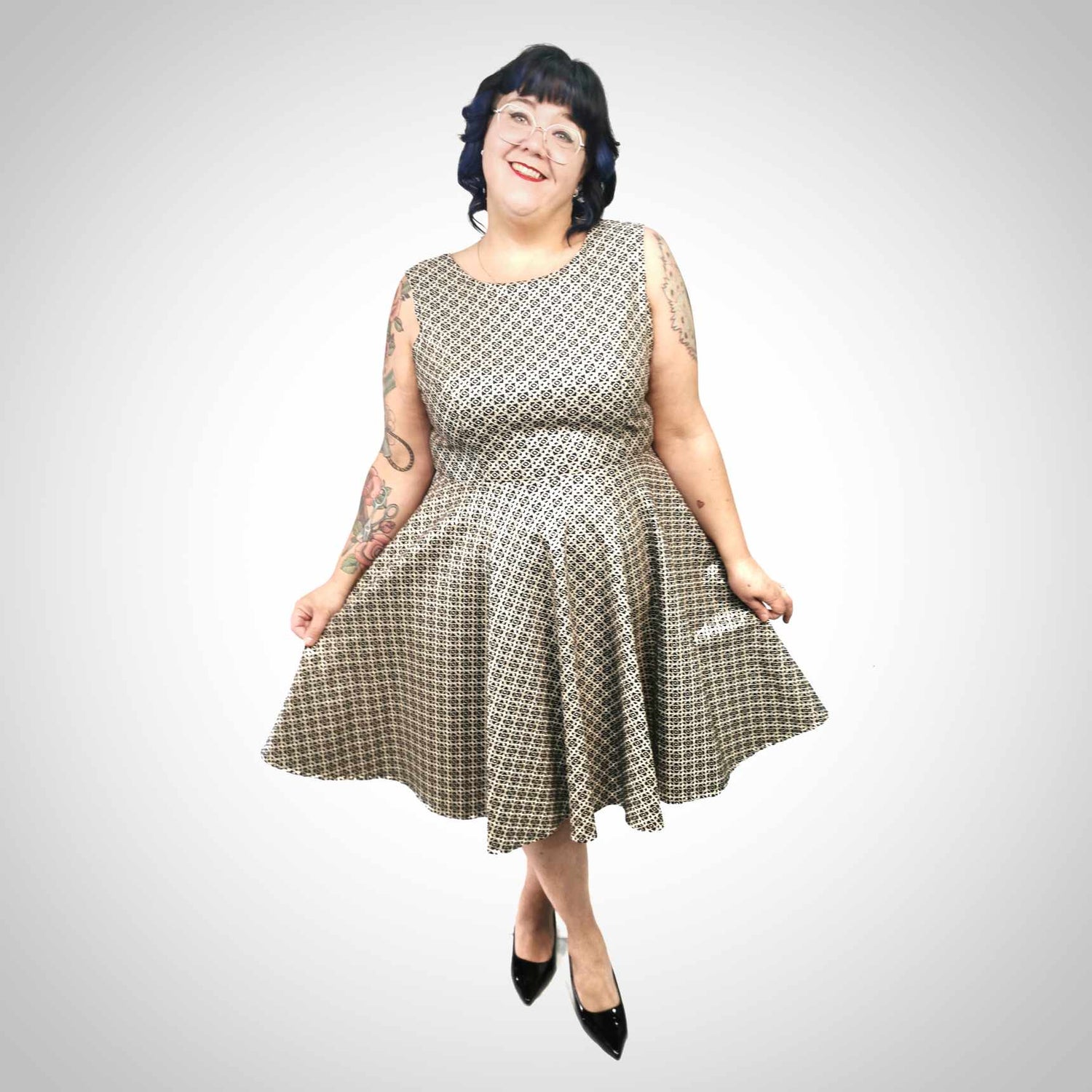 Robe taille plus ligne A motifs dorés
