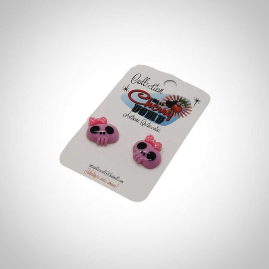 Boucles d'oreilles crânes mauves