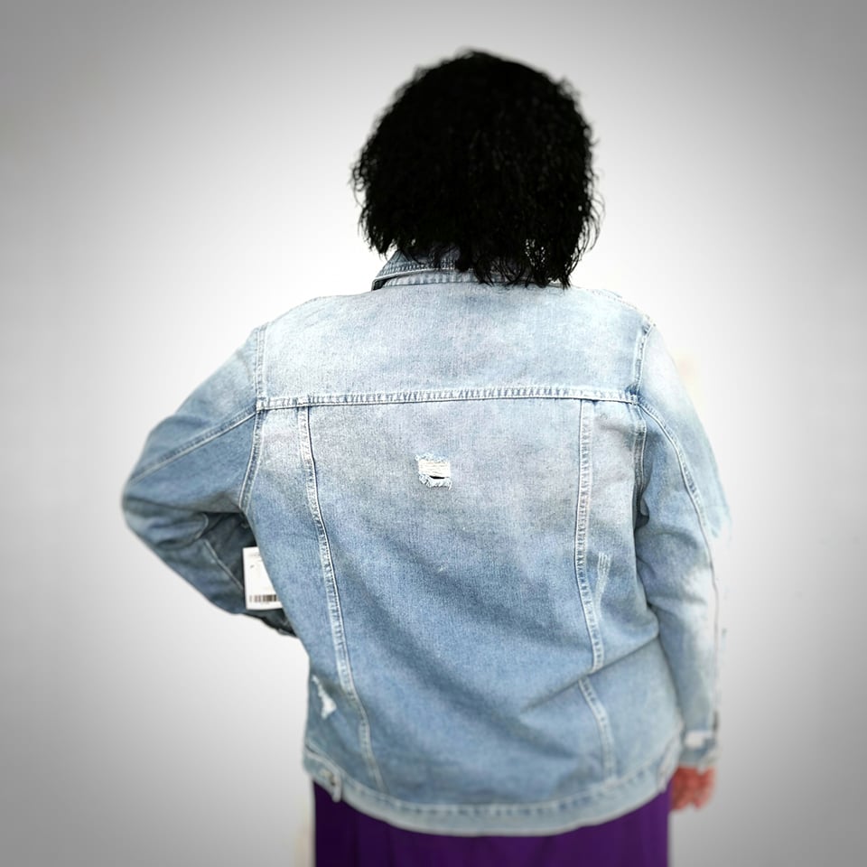 Jean jacket with holes
