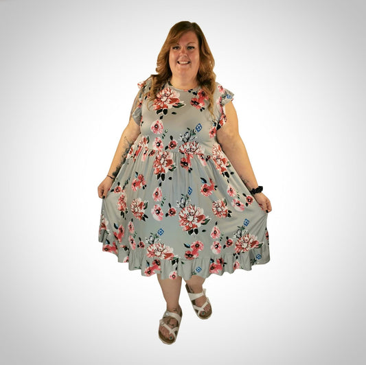 Robe bleu à fleurs à manches frivoles