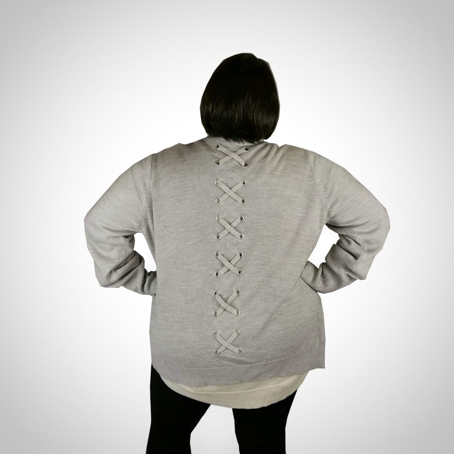 Gray knit jacket with crossed back